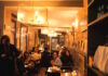 París - Bistró - Interior de un pequeño bistró parisino durante la cena